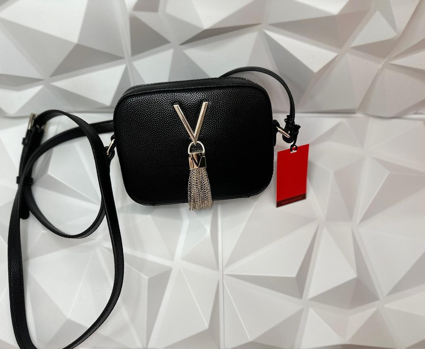 Mini bolso Valentino.
