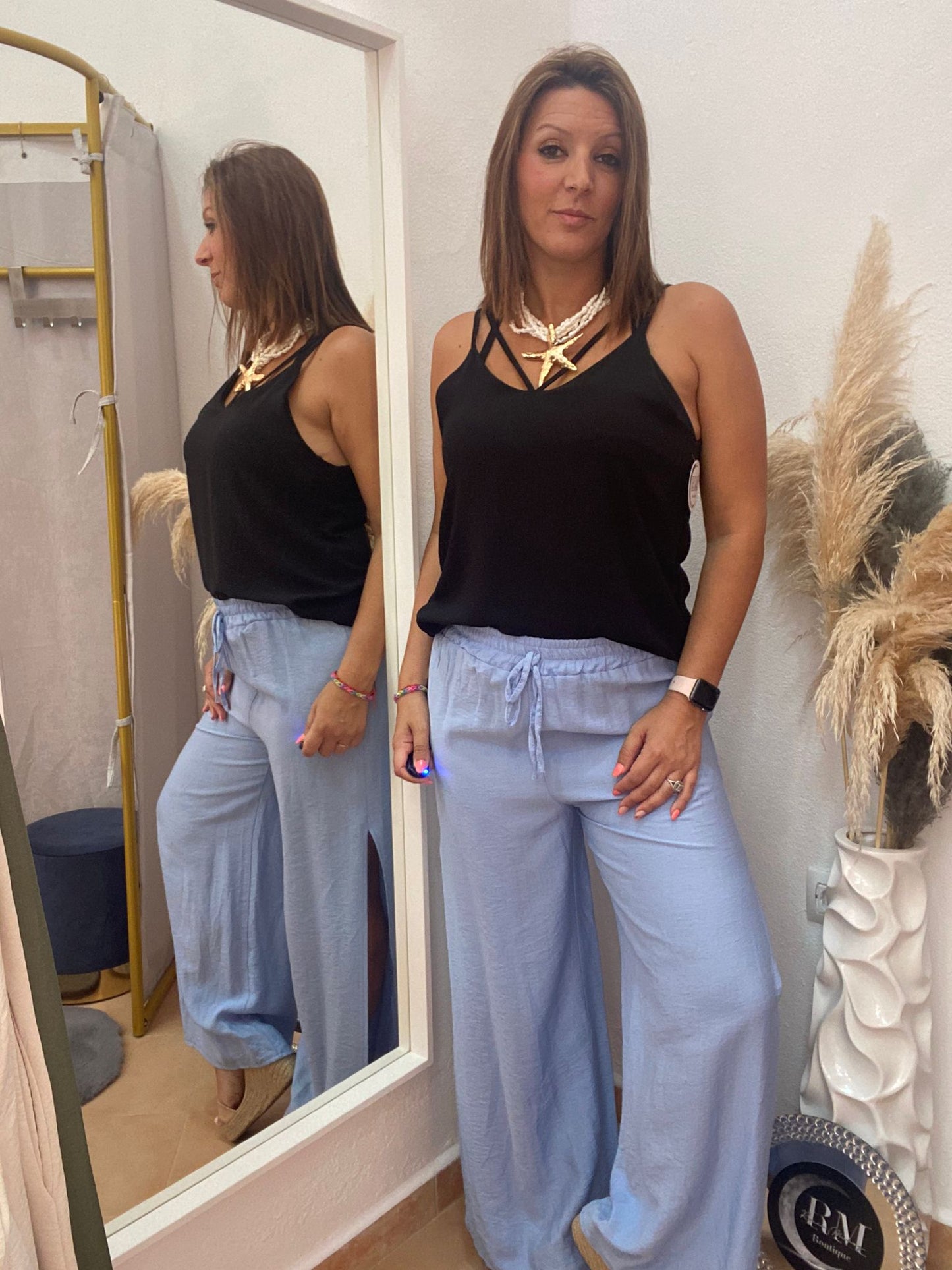 PANTALON APERTURA CELESTE.