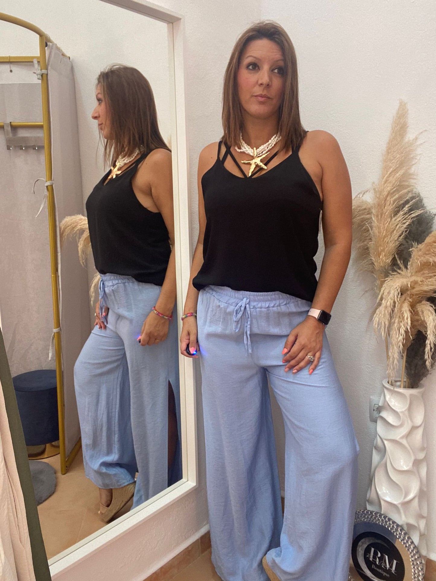 PANTALON APERTURA CELESTE.